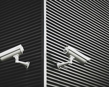 CCTV cameras installed on an exterior wall by security engineers